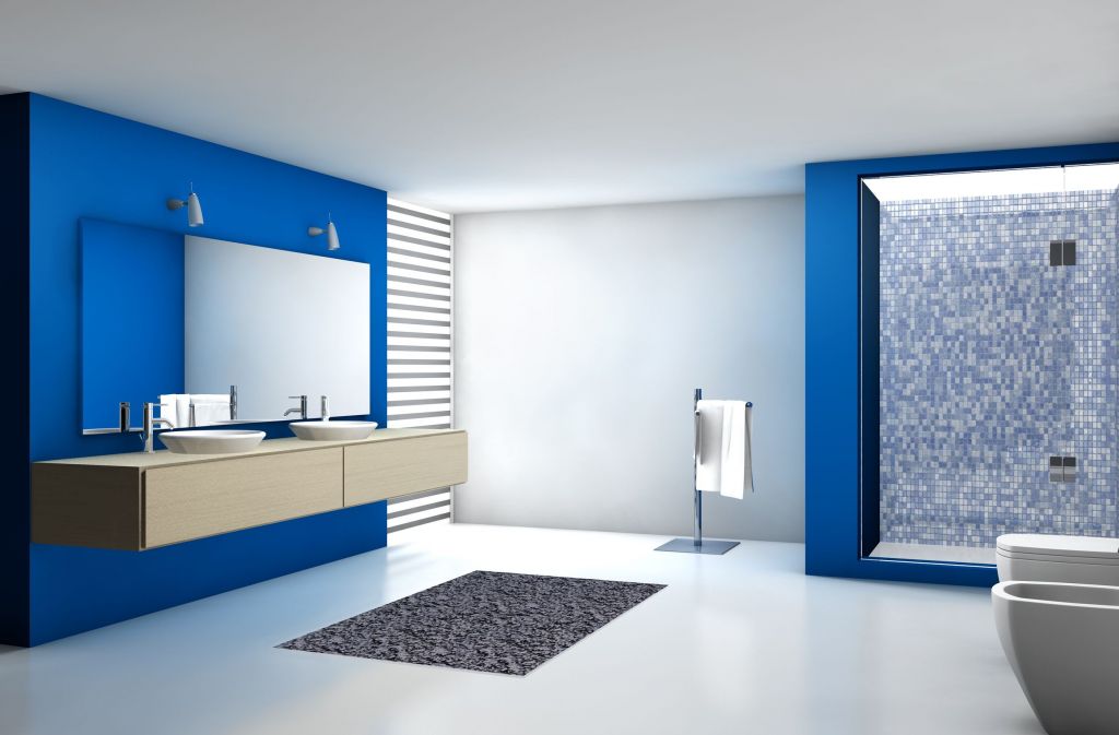 Baño de una gran suit en Diagonal Mar El azul intenso ha sido el color seleccionado para pintar este espectacular baño, integrando este color con el resiste de la ducha.